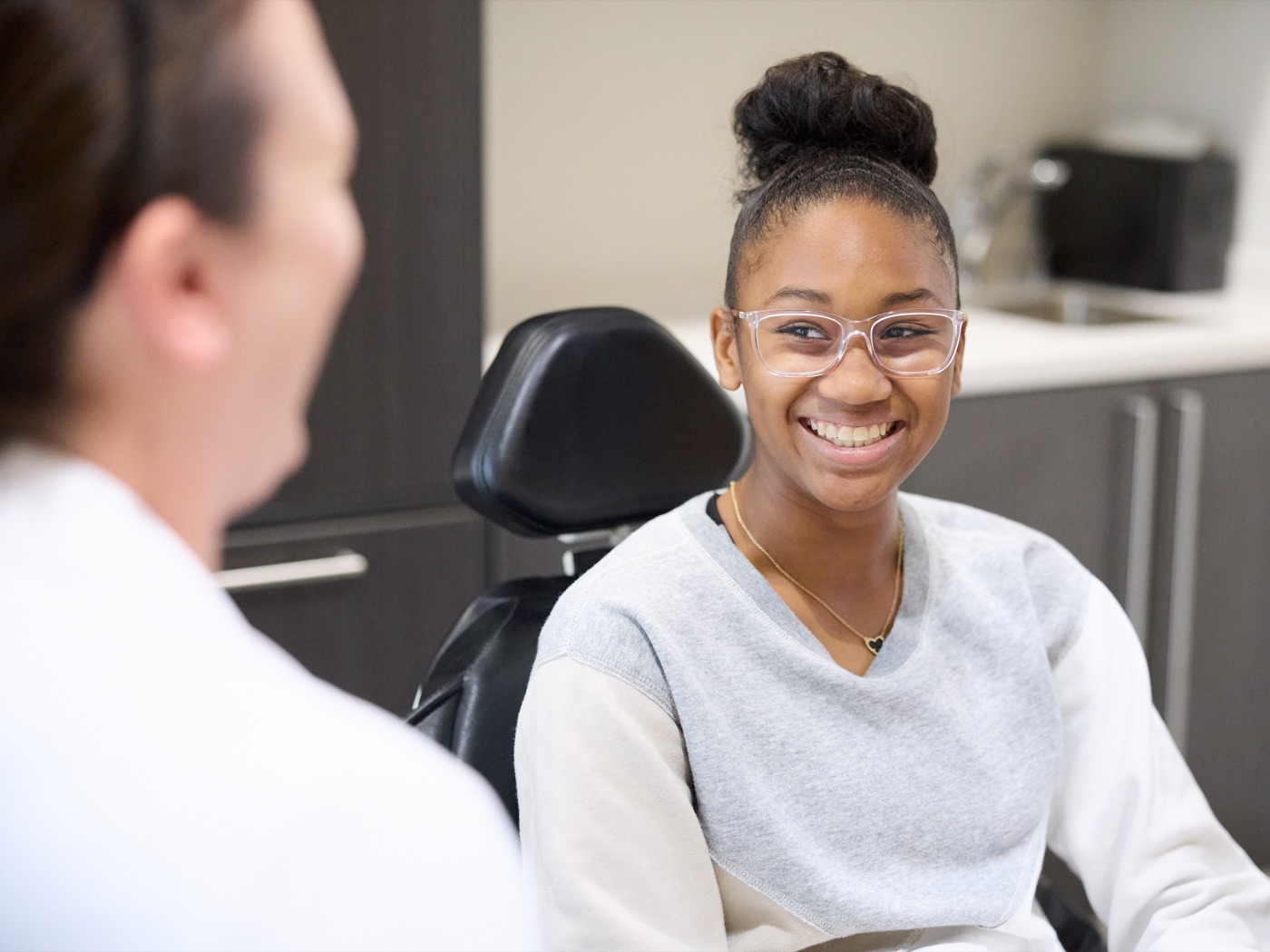 A patient talking with Dr. Rebecca